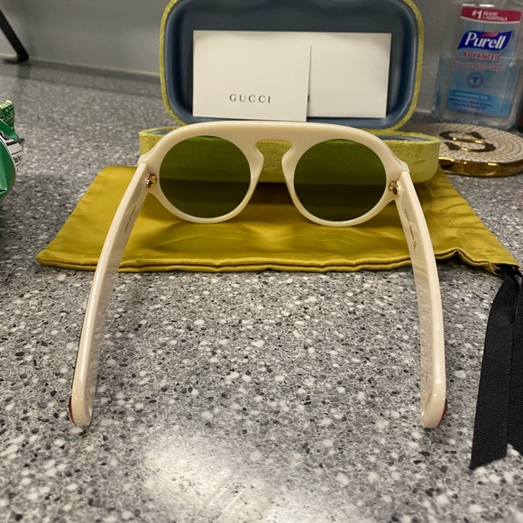 Unisex sunglasses, Brand new comes with case, identification card. - Picture 2 of 5